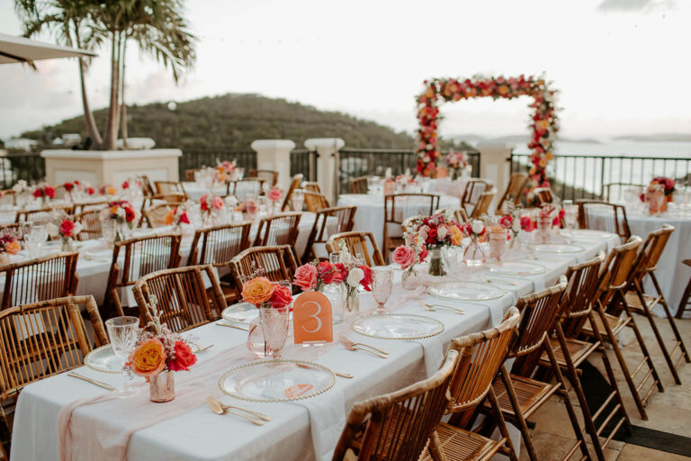 Tables prepped for a beautiful outdoor wedding reception at a villa from The Hills St John