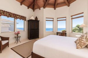 One of the bedrooms in the View Come True villa with a stunning view onto Cruz Bay.