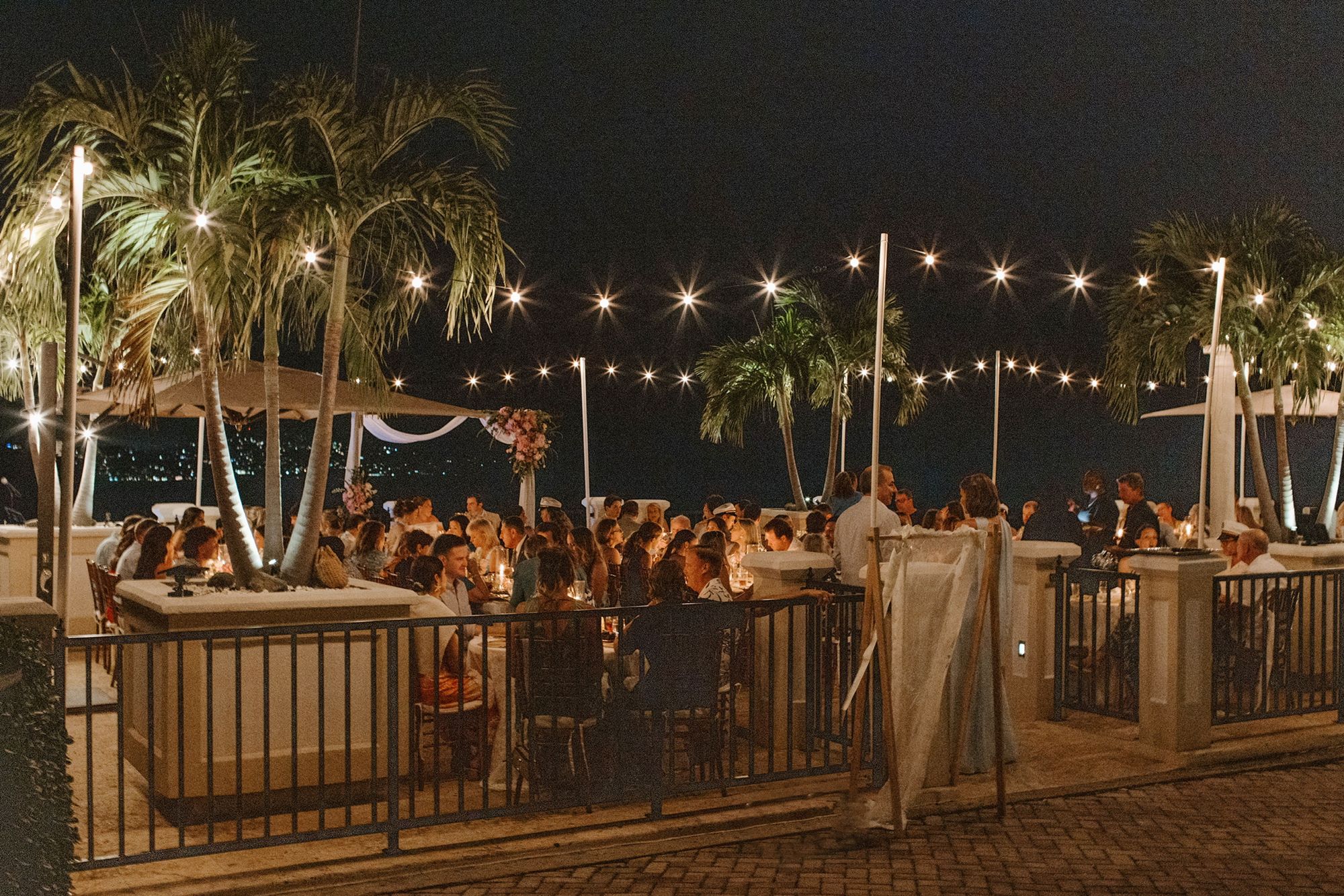 Wedding dinner under string lights and stars on the terrace at The Hills St. John